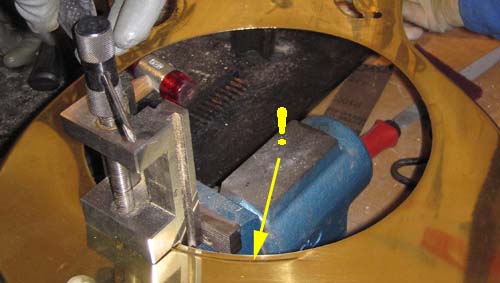 bending the sound well hole using a vise